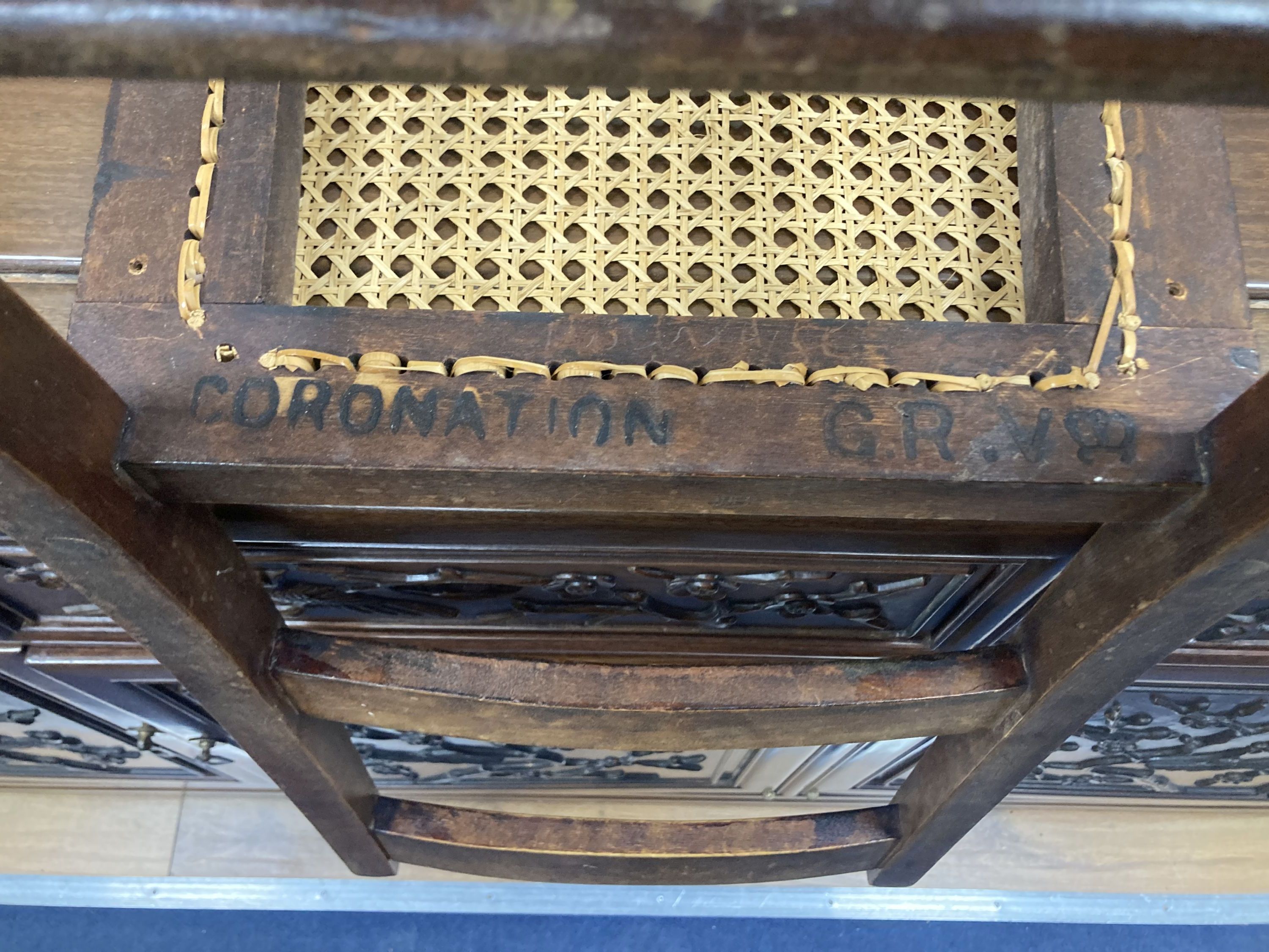 A pair of George V Coronation chairs stamped with Royal Cypher